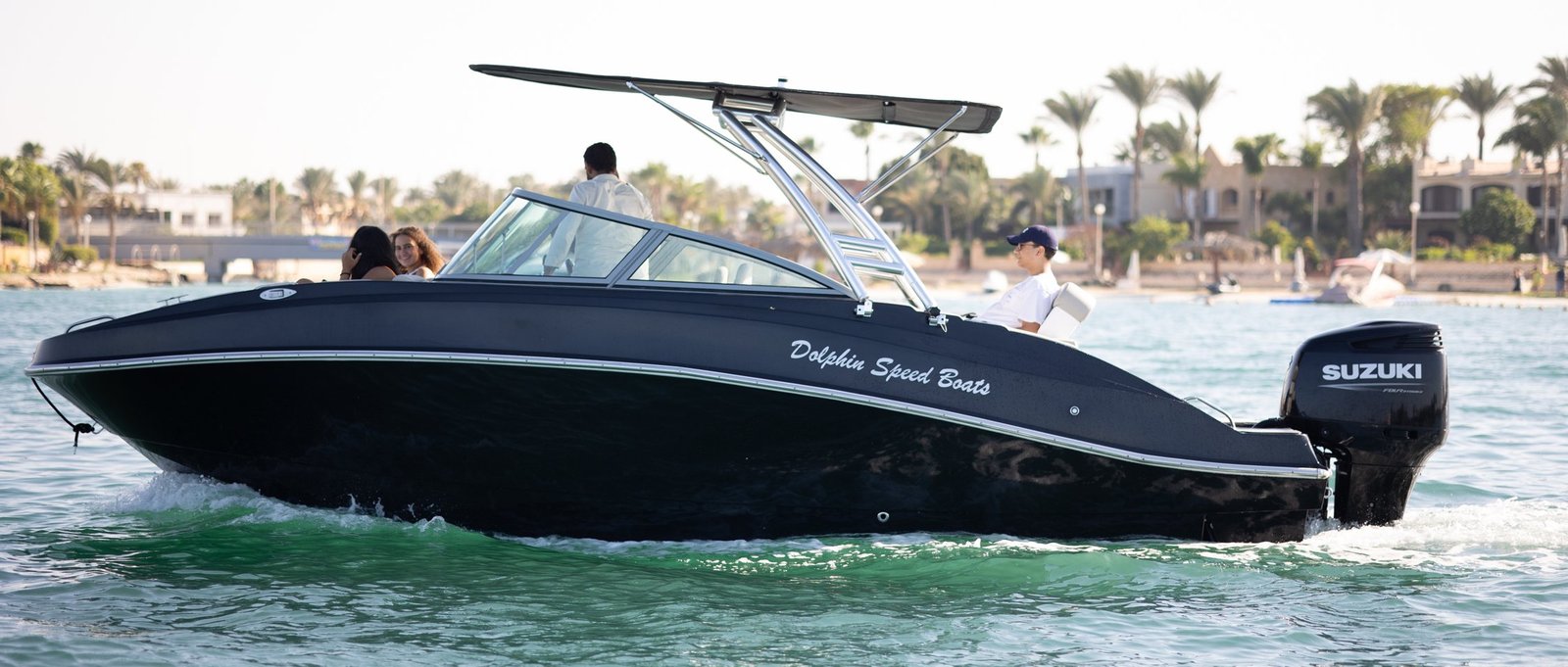 Dolphin Legend cruising past the marina, Alexandria